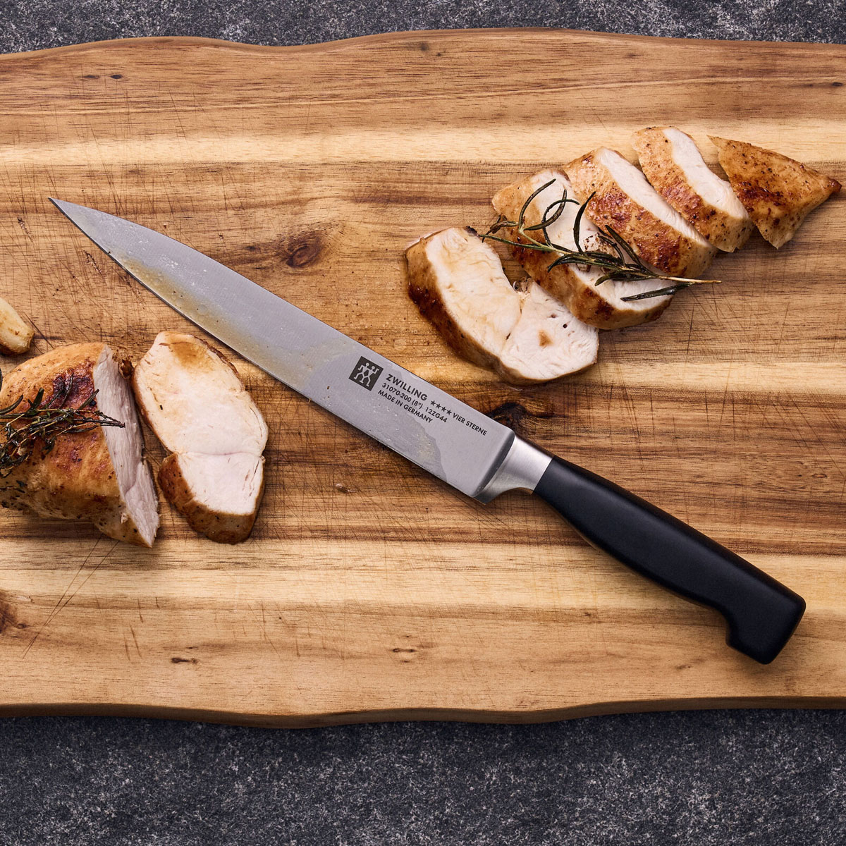 

Нож поварской Zwilling Four Star