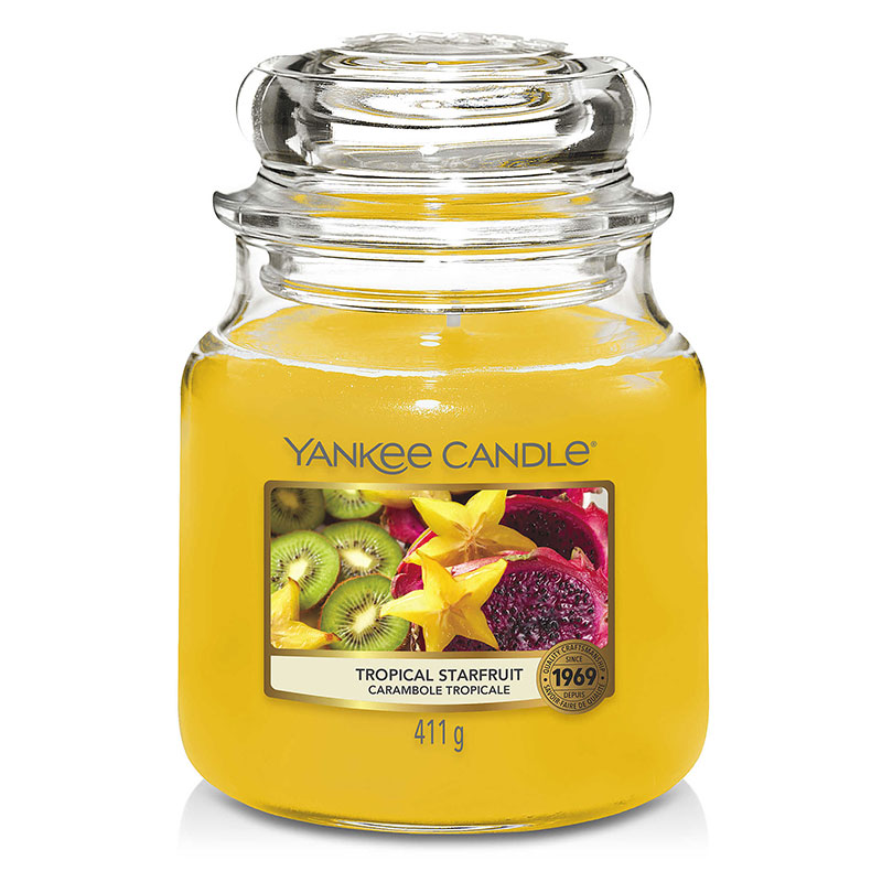 Свеча средняя в стеклянной банке Yankee Candle Тропический карамбол свеча большая в стеклянной банке yankee candle свежий персик